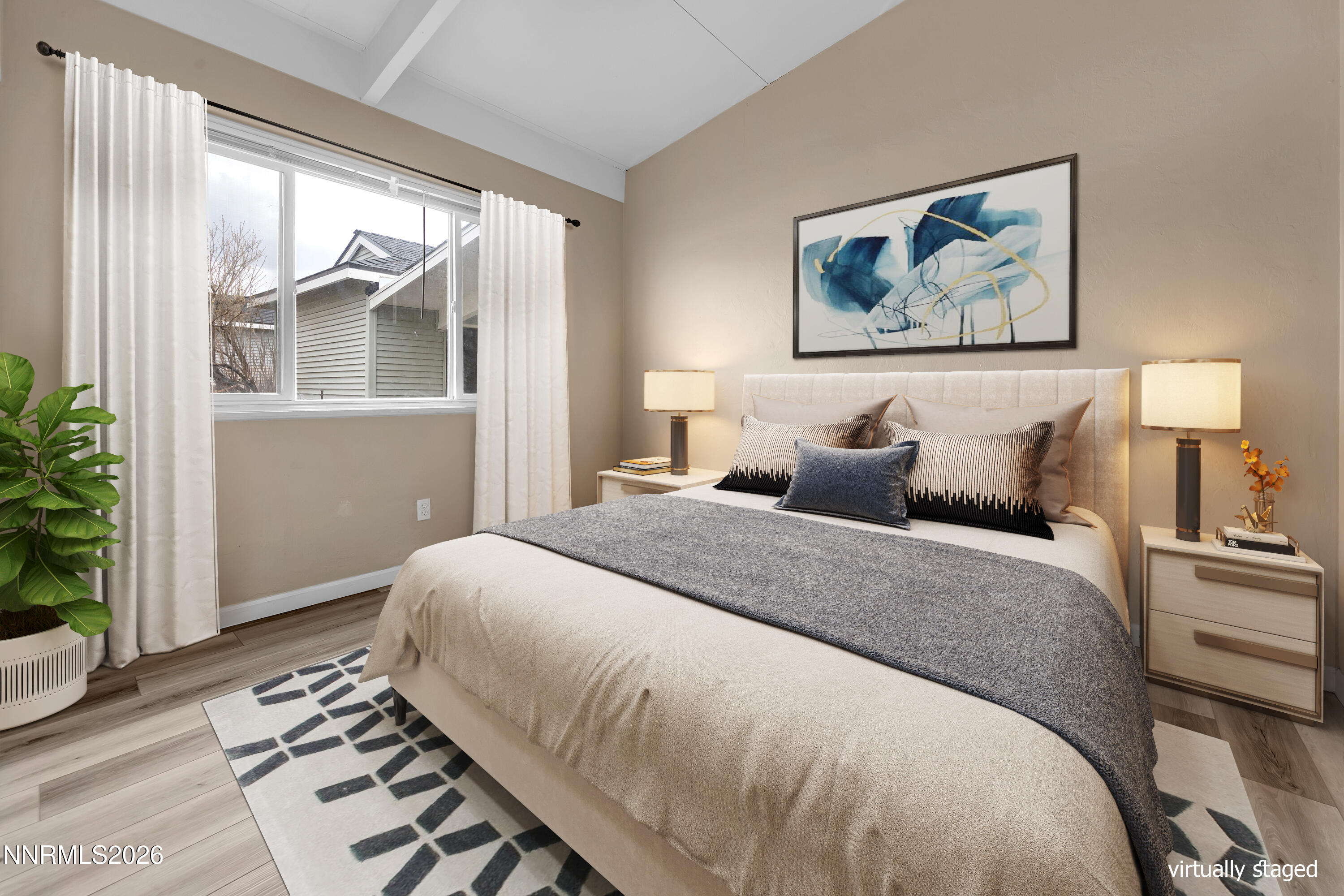 5381 Teton Street Reno, NV 89506 - Photo 13 of 28 a bedroom with bed and wooden floor