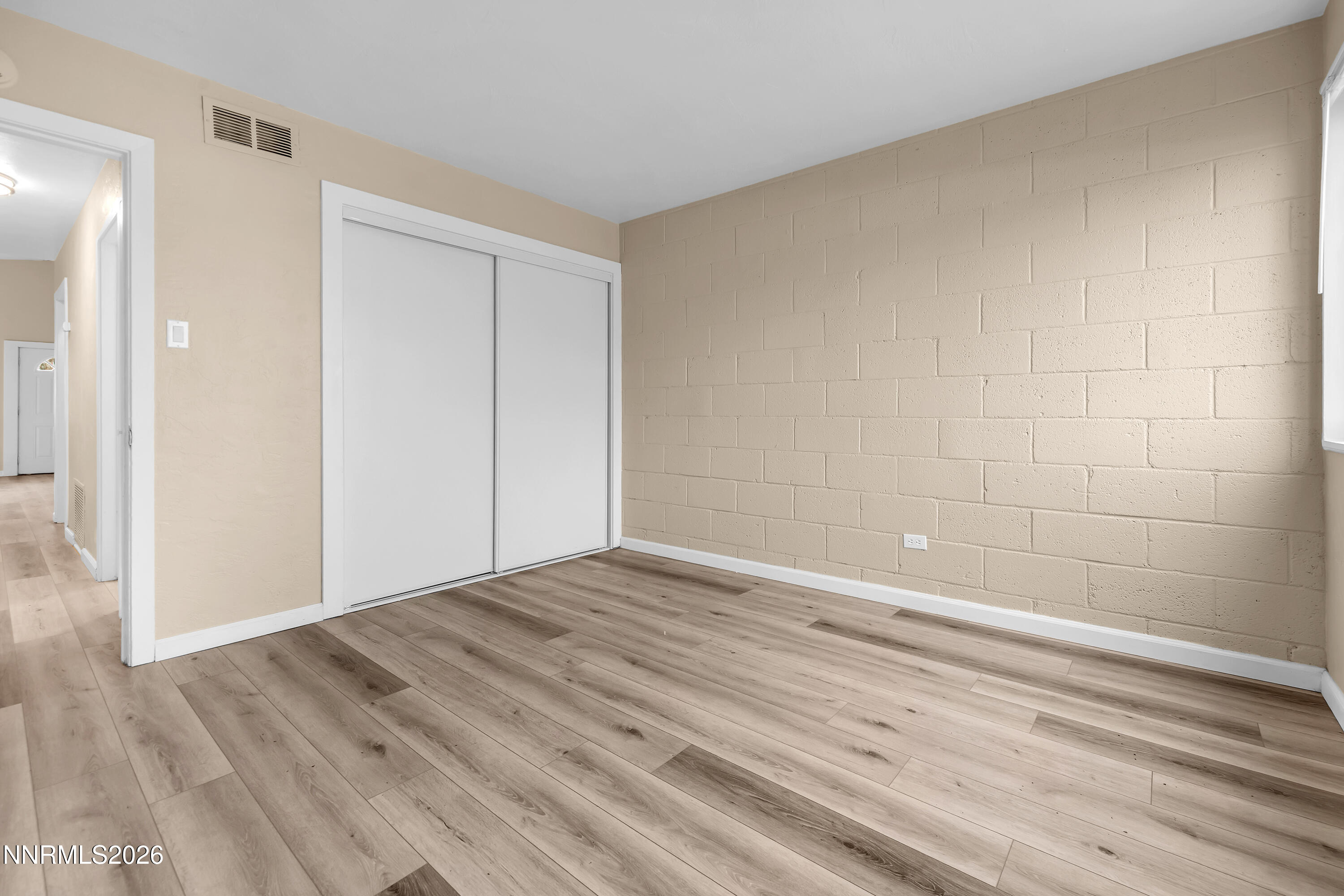 5381 Teton Street Reno, NV 89506 - Photo 21 of 28 wooden floor in an empty room