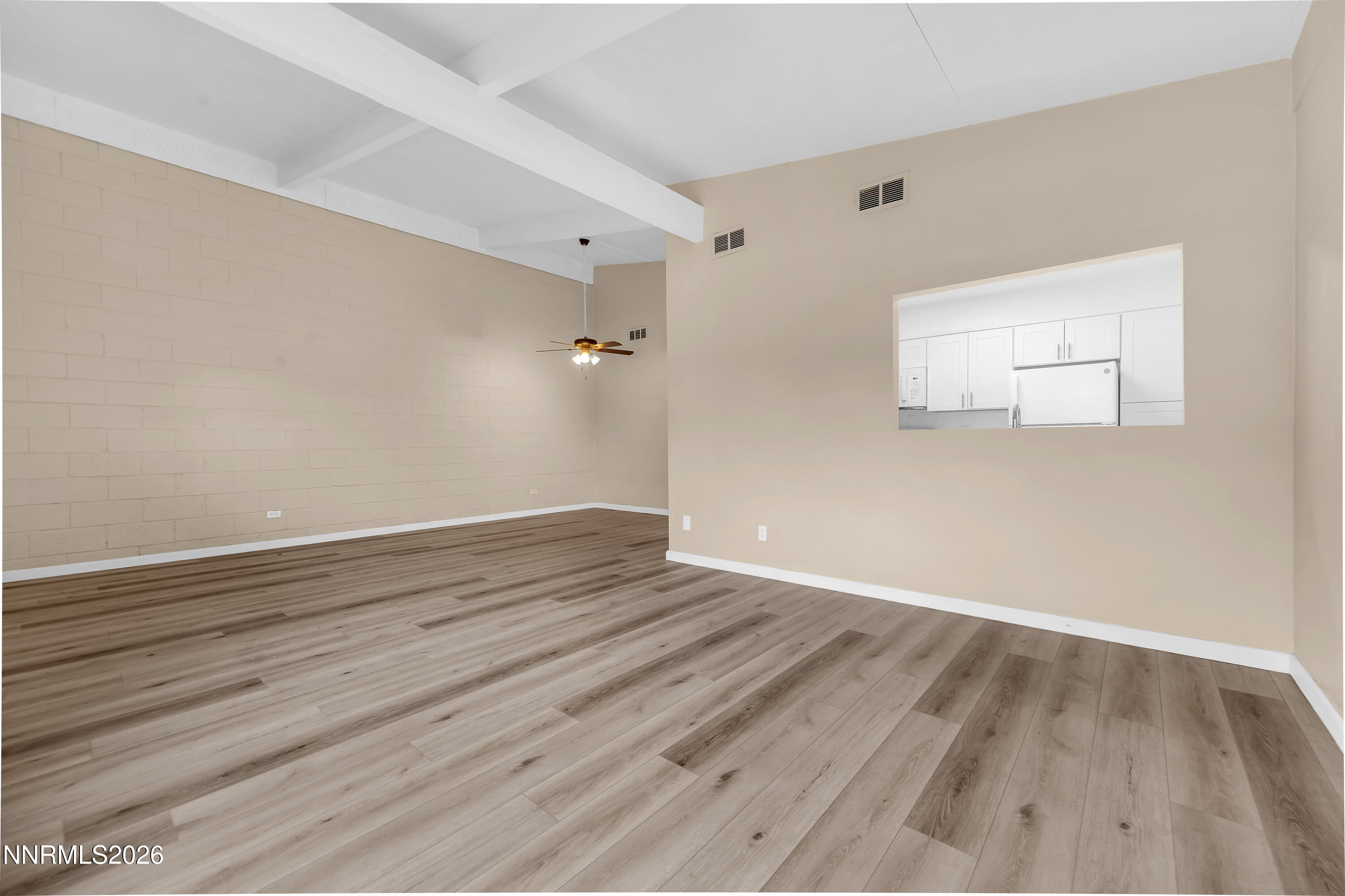 5381 Teton Street Reno, NV 89506 - Photo 5 of 28 wooden floor in an empty room