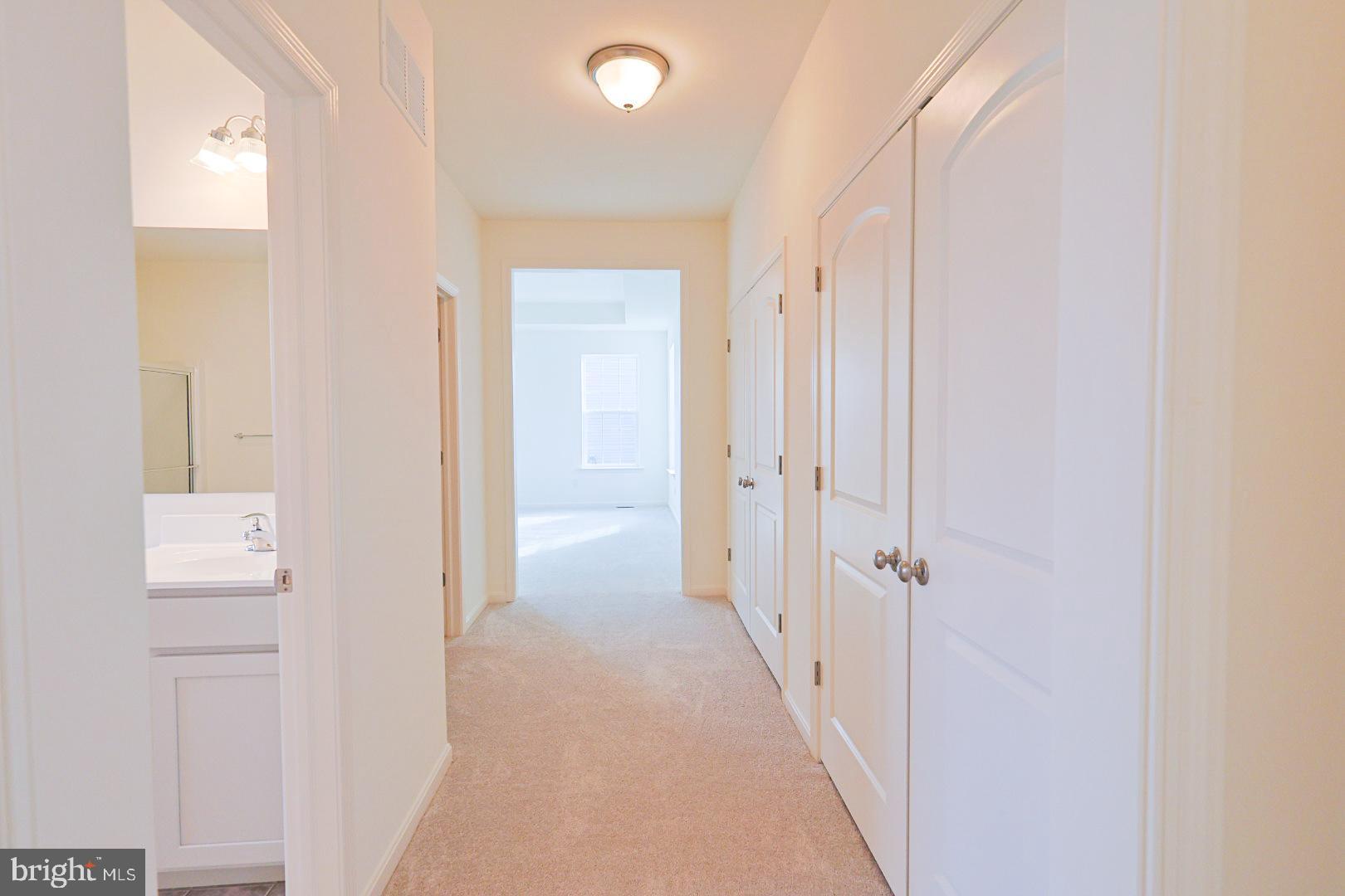 910 Weatherstone Lane Felton, DE 19943 - Photo 12 of 22 a view of a hallway with a elevator