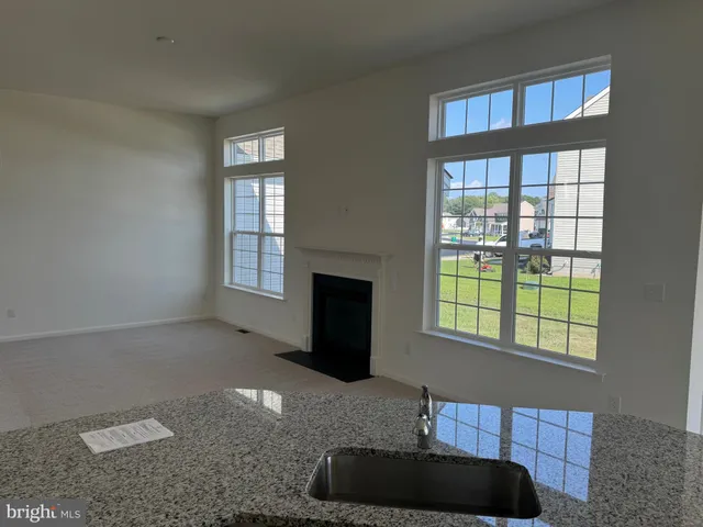a living room with a fireplace