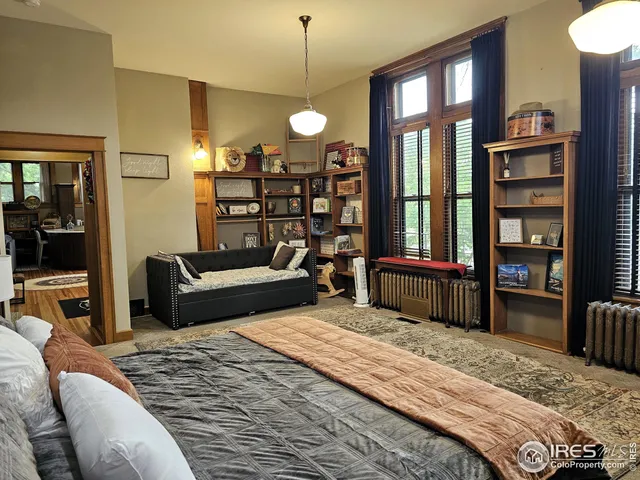 a kitchen with stainless steel appliances kitchen island granite countertop a sink and cabinets