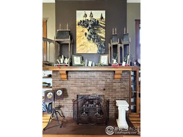 a kitchen with a sink cabinets and a large window