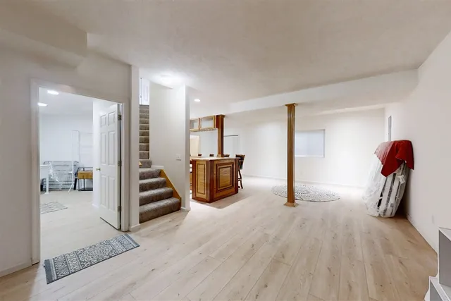 a view of a living room and entryway