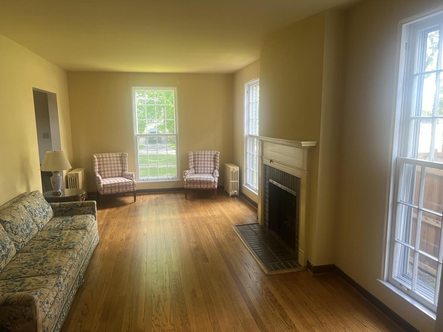 1253 Cherry Street Winnetka, IL 60093 - Photo 4 of 11 a living room with furniture and a fireplace