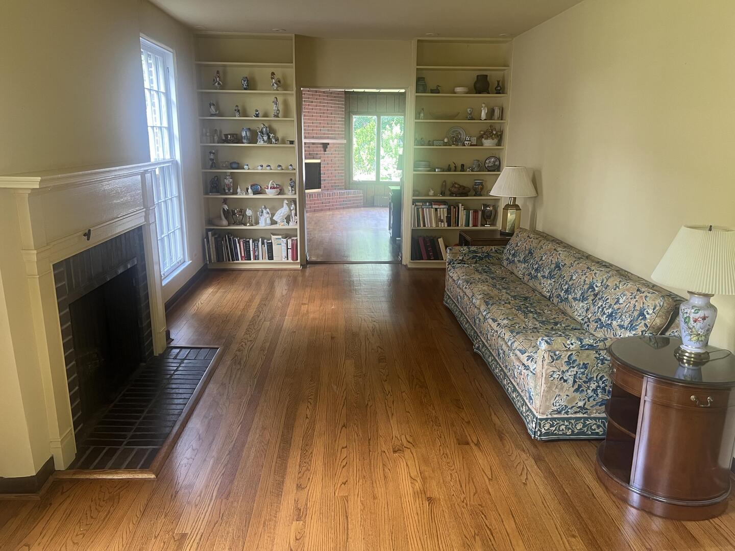 1253 Cherry Street Winnetka, IL 60093 - Photo 5 of 11 a living room with furniture and a fireplace