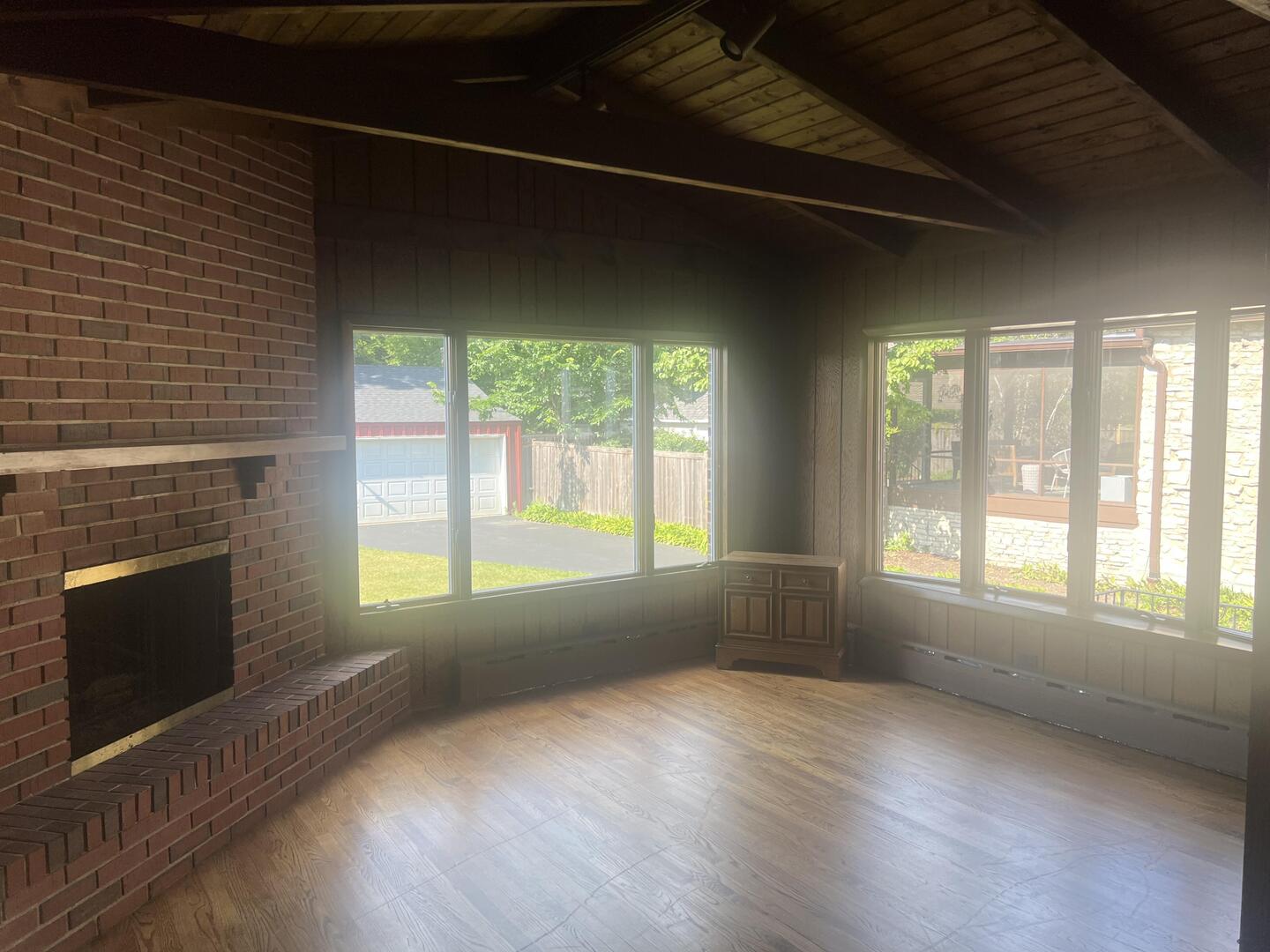 1253 Cherry Street Winnetka, IL 60093 - Photo 6 of 11 an empty room with wooden floor and windows