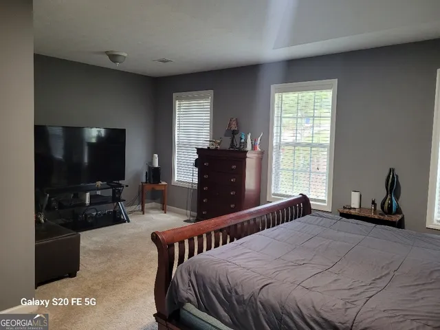 a view of a livingroom with furniture