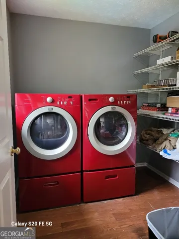 a utility room with dryer and washer