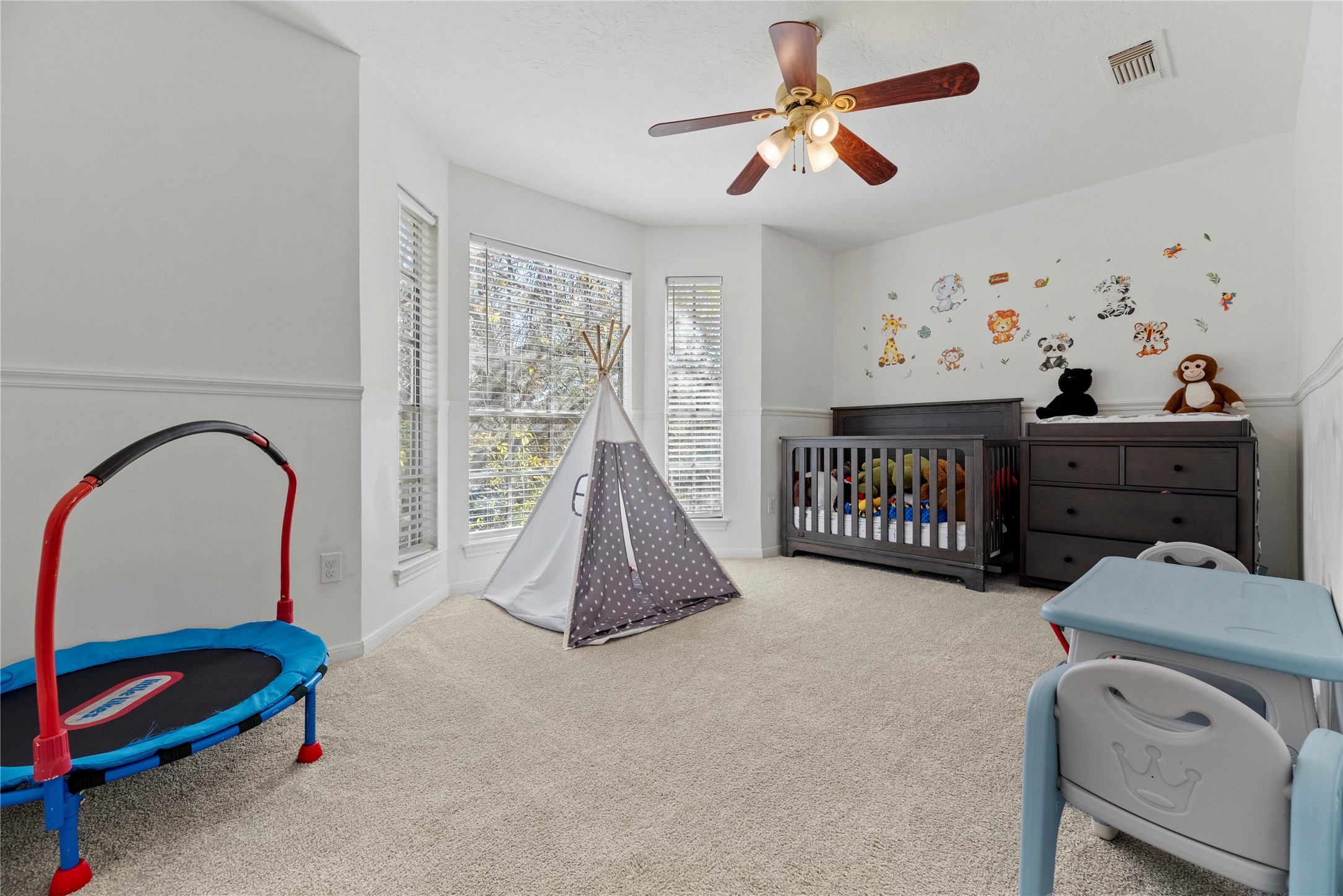 14926 Camino Rancho Drive Houston, TX 77083 - Photo 16 of 22 The third bedroom presents a peaceful retreat, with bay windows and a spacious layout, ready for your personal touches.
