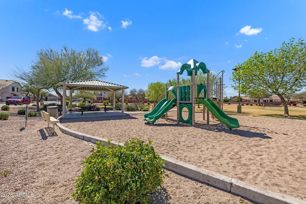 a view of a house with a snow in the yard