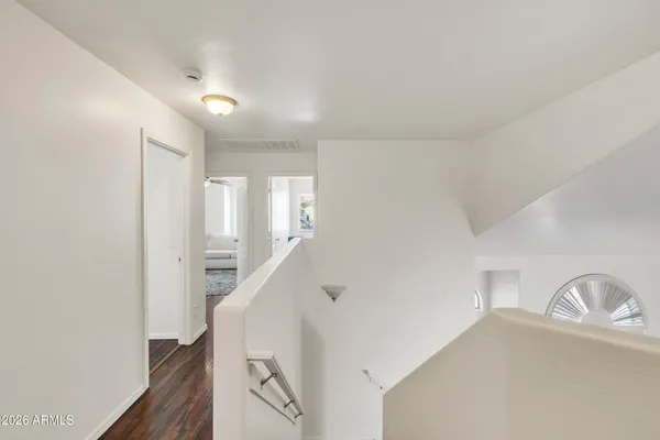 a kitchen with a sink stove cabinets and refrigerator