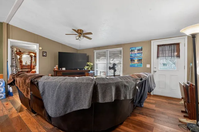 a bed room with bed and window