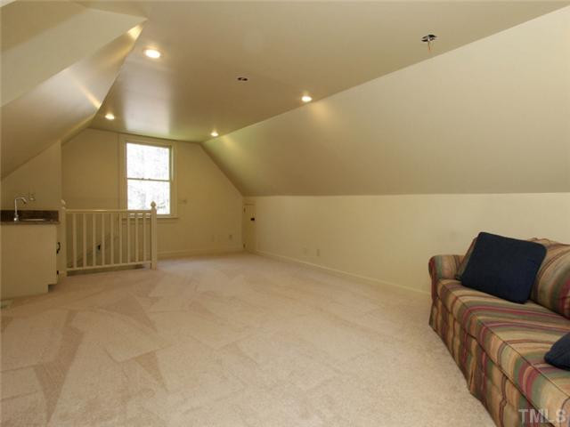 5504 Fallen Leaf Court Raleigh, NC 27606 - Photo 19 of 25 Large bonus room with wet bar and back entry stairs