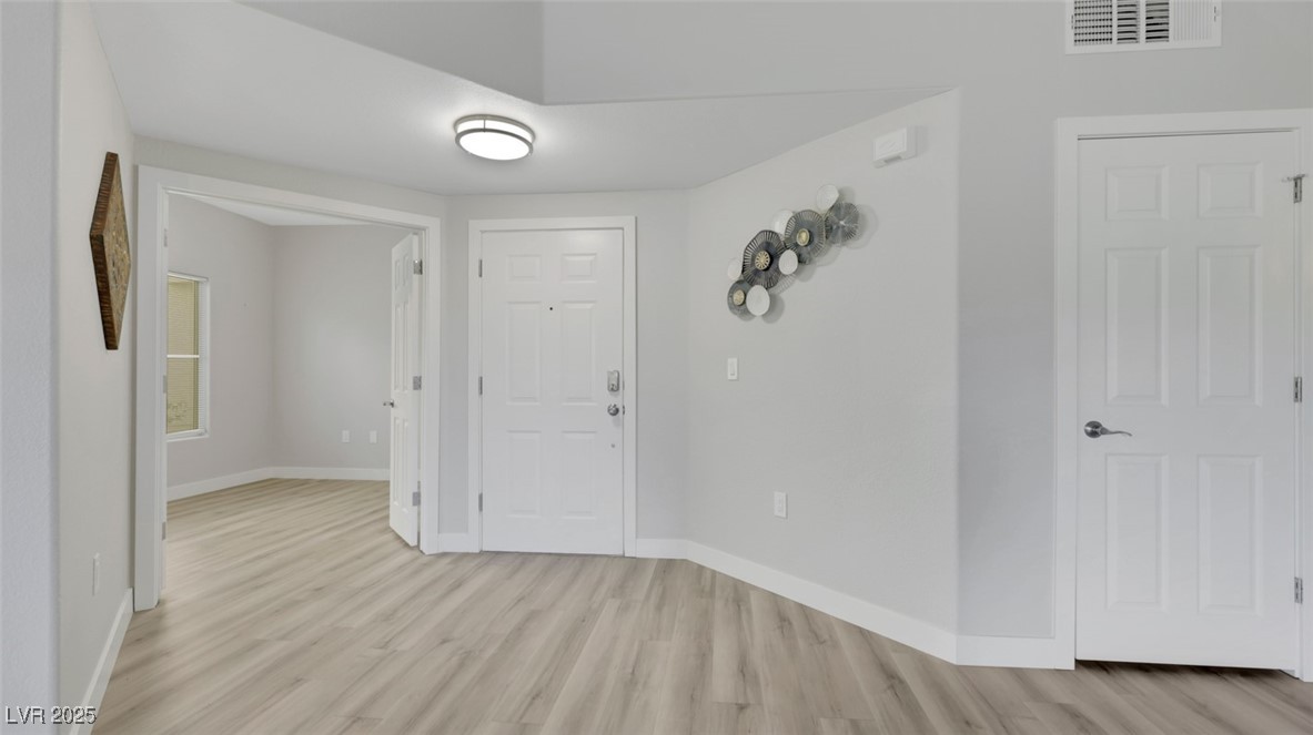 4921 Black Bear Road, Unit 104 Las Vegas, NV 89149 - Photo 11 of 35 looking toward den (situated between front door and kitchen off great room)