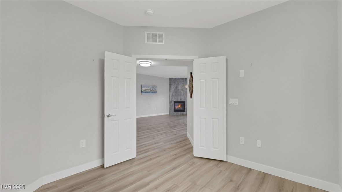 4921 Black Bear Road, Unit 104 Las Vegas, NV 89149 - Photo 28 of 35 Den with double doors