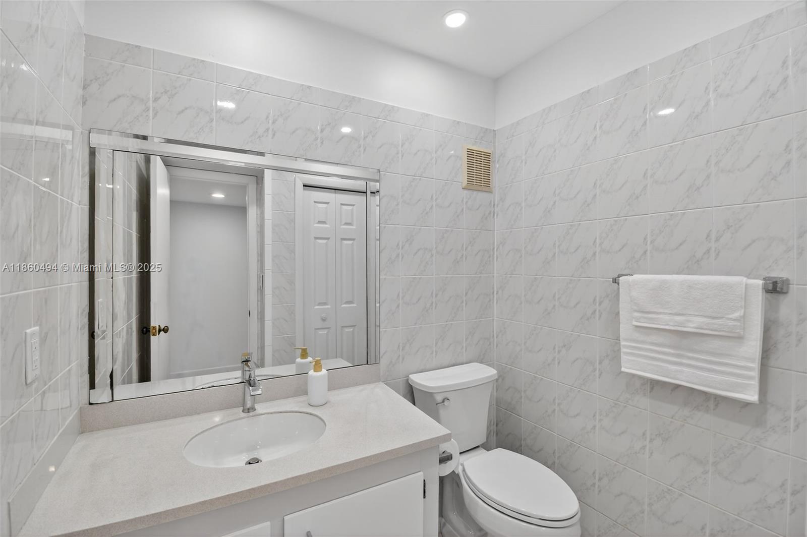 16400 Golf Club Road, Unit 307 Weston, FL 33326 - Photo 22 of 27 Half Bath / Powder Room