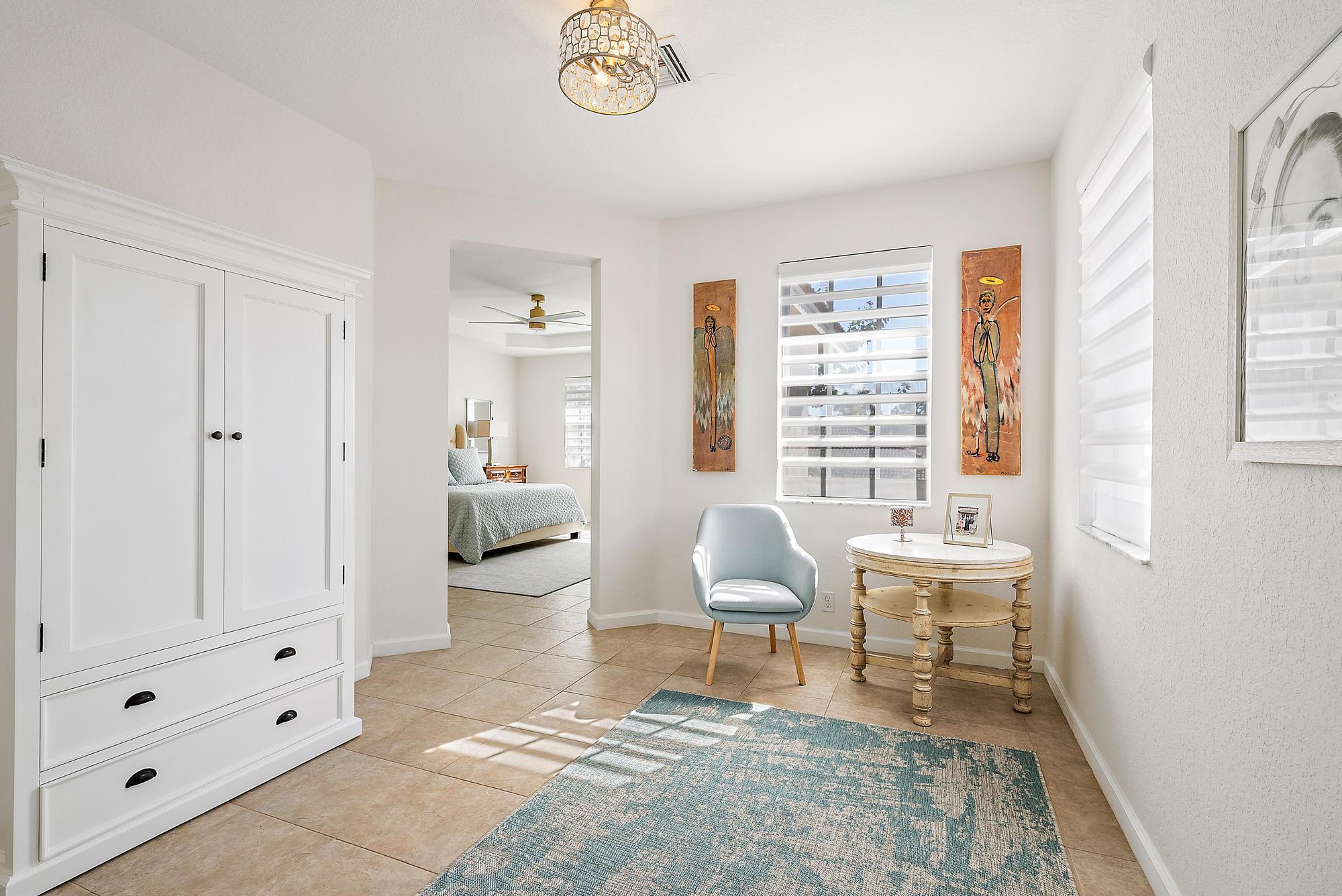 114 Via Santa Cruz Jupiter, FL 33458 - Photo 17 of 48 Sitting Area in Primary Suite