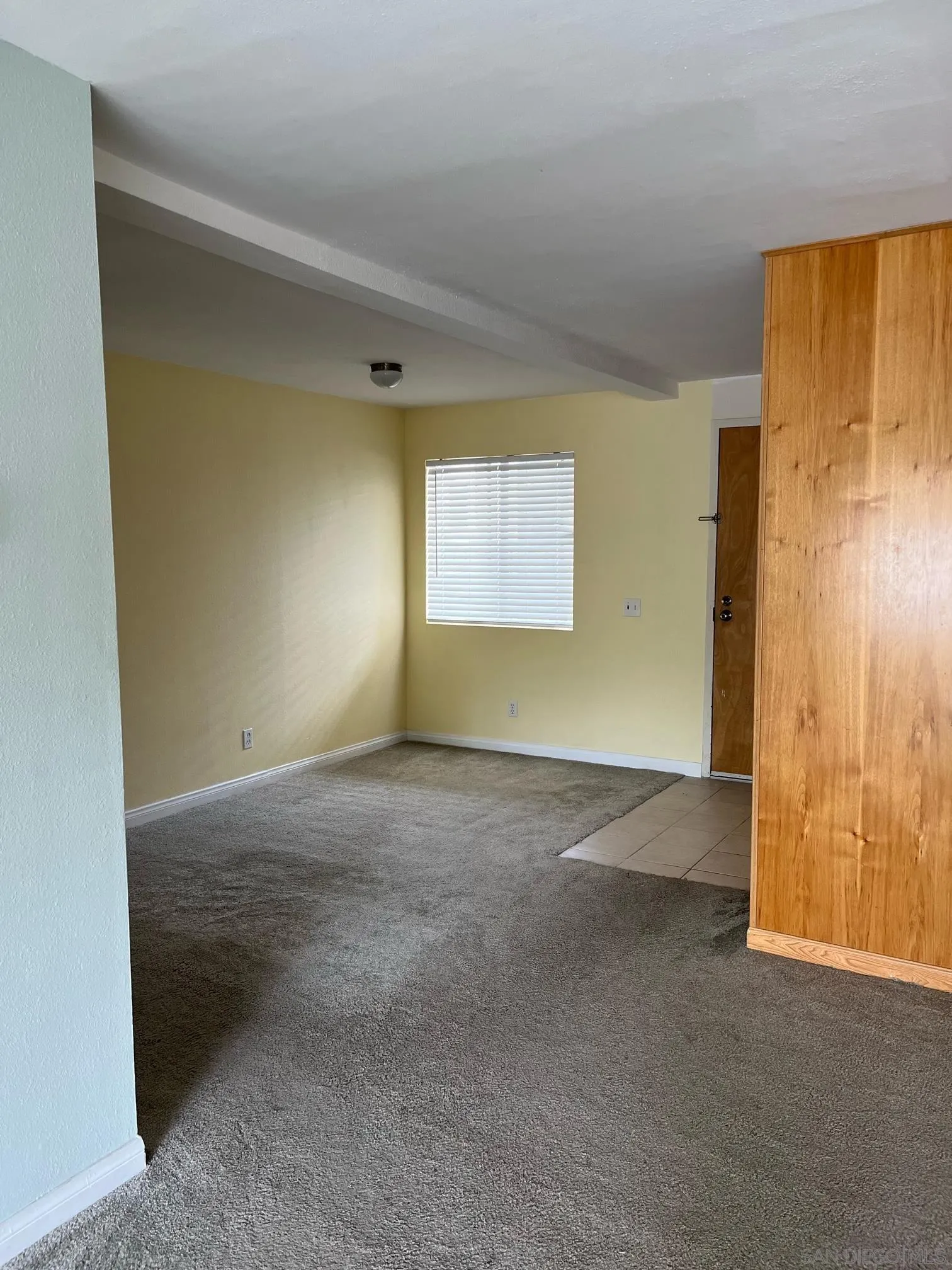 8332 Regents Road, Unit 1M San Diego, CA 92122 - Photo 2 of 18 a view of an empty room with windows