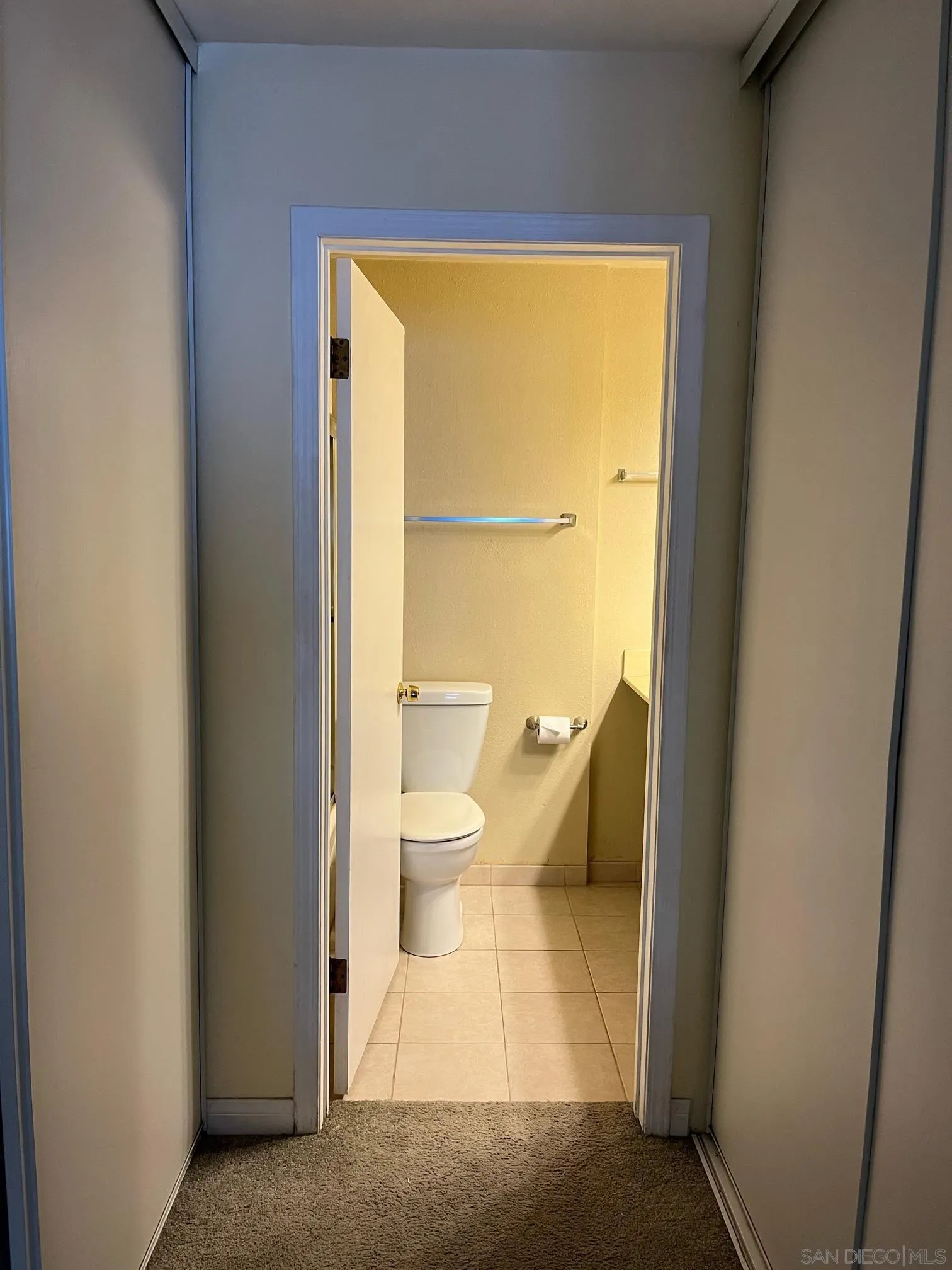 8332 Regents Road, Unit 1M San Diego, CA 92122 - Photo 10 of 18 a bathroom with a toilet