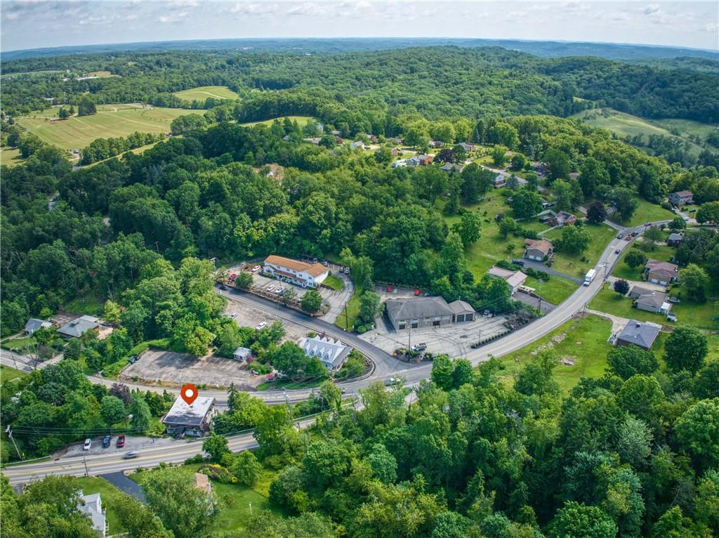 2807 Middle Road Glenshaw, PA 15116 - Photo 11 of 34 an aerial view of a houses with a yard and lake