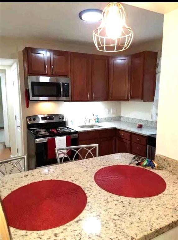 2807 Middle Road Glenshaw, PA 15116 - Photo 15 of 34 a kitchen with a sink cabinets and stainless steel appliances