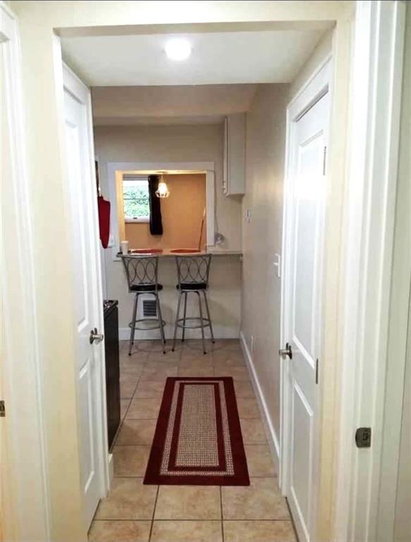 2807 Middle Road Glenshaw, PA 15116 - Photo 16 of 34 a view of a hallway with wooden floor and furniture