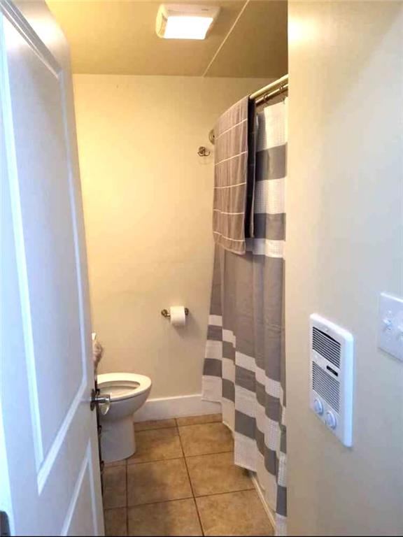 2807 Middle Road Glenshaw, PA 15116 - Photo 20 of 34 a bathroom with a toilet and a shower