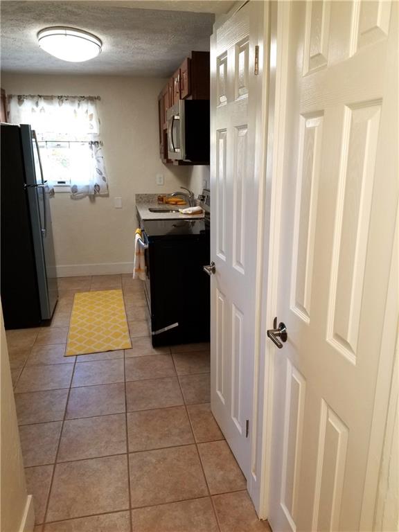 2807 Middle Road Glenshaw, PA 15116 - Photo 23 of 34 a view of kitchen with window and refrigerator