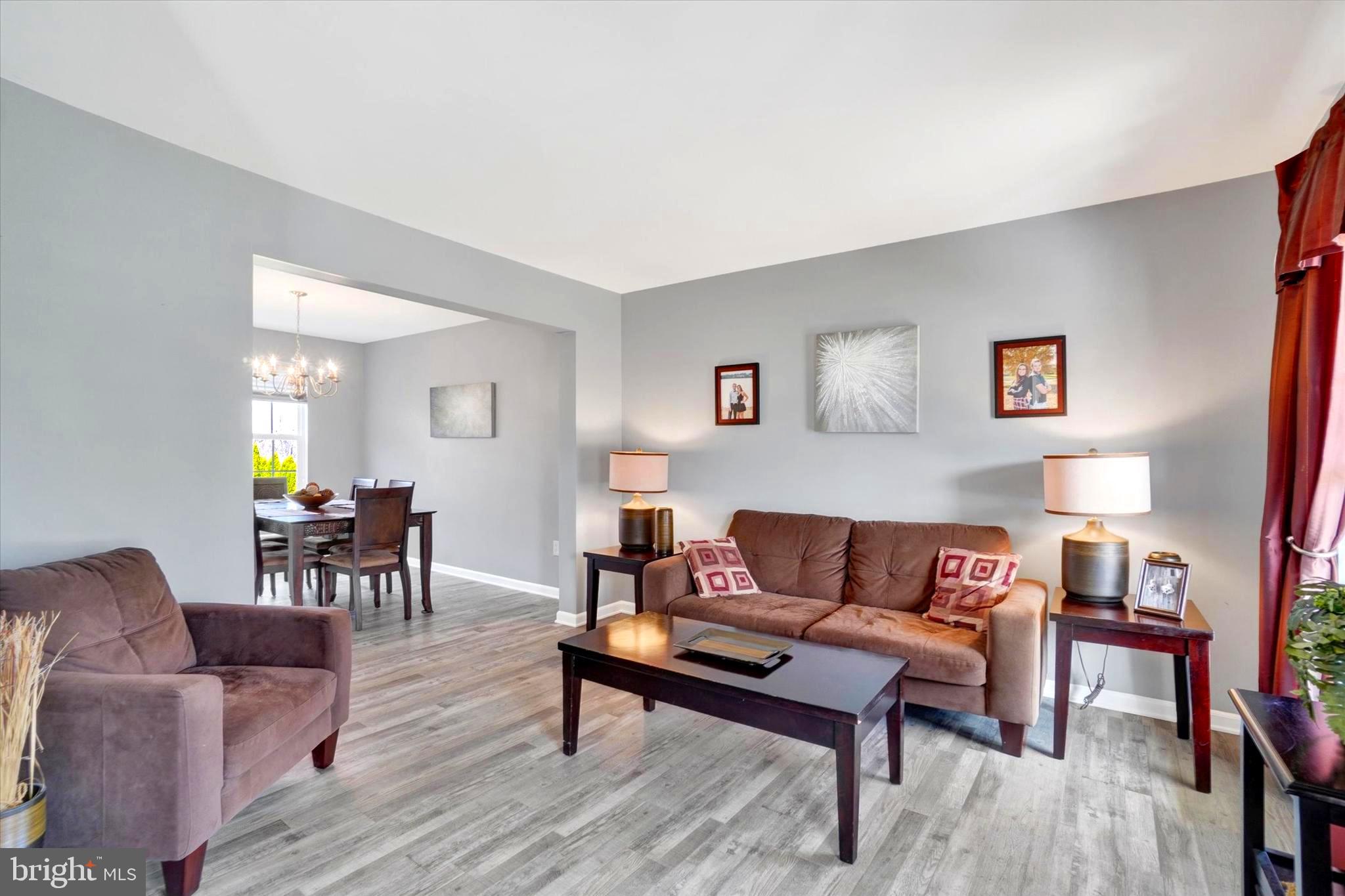2512 Codorus Lane Spring Grove, PA 17362 - Photo 16 of 42 a living room with furniture a rug and a table