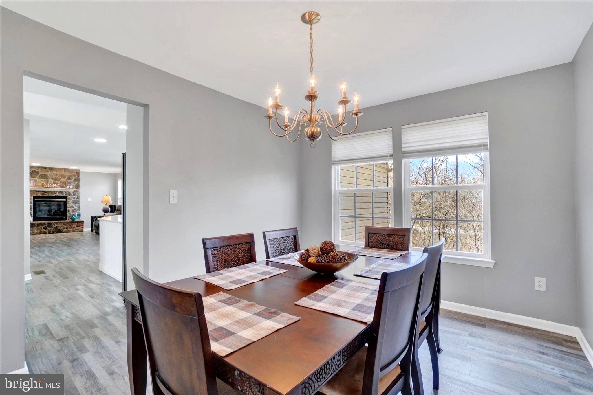 2512 Codorus Lane Spring Grove, PA 17362 - Photo 18 of 42 a view of a dining room with furniture window and wooden floor