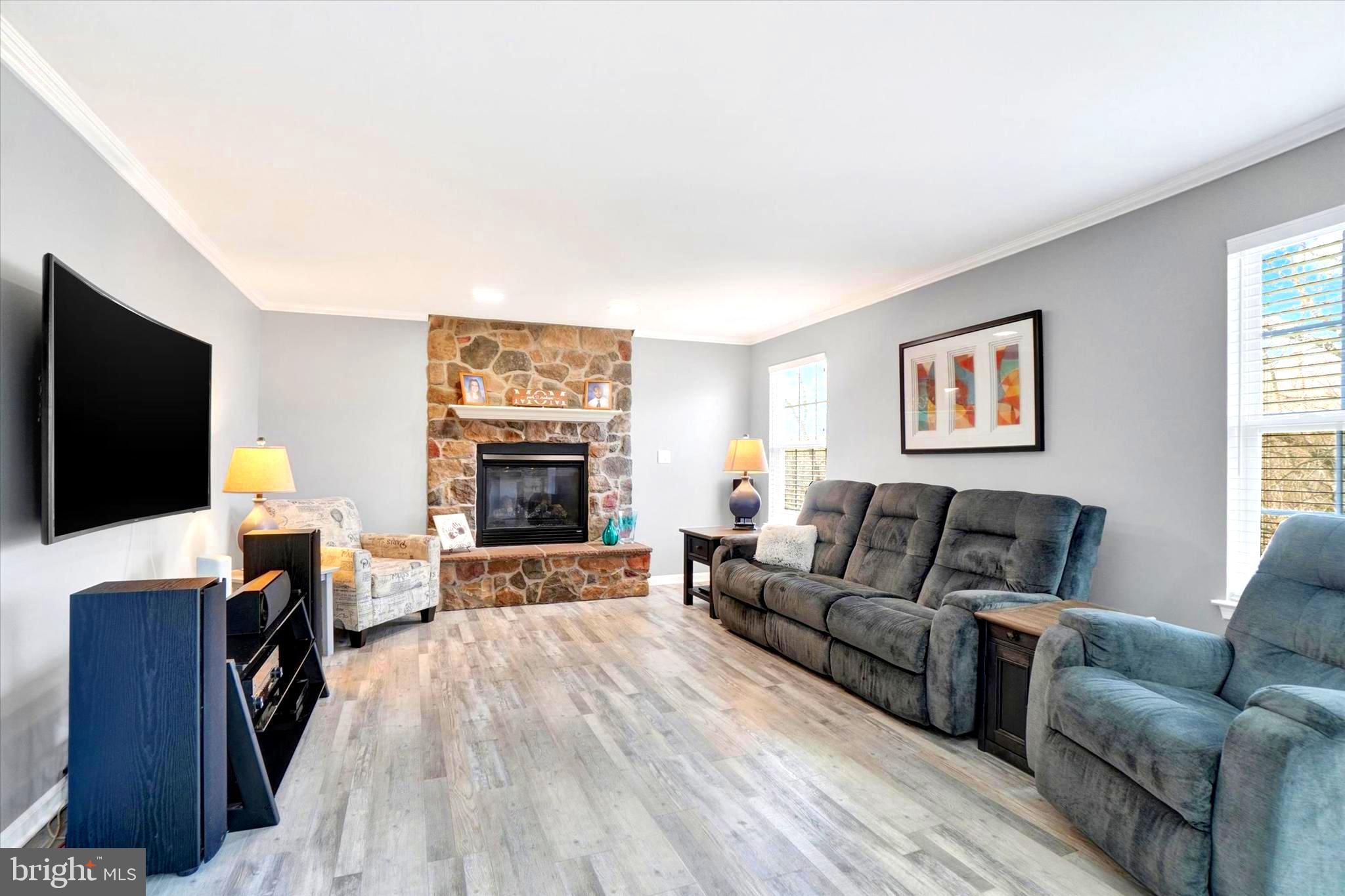 2512 Codorus Lane Spring Grove, PA 17362 - Photo 24 of 42 a living room with furniture and a flat screen tv