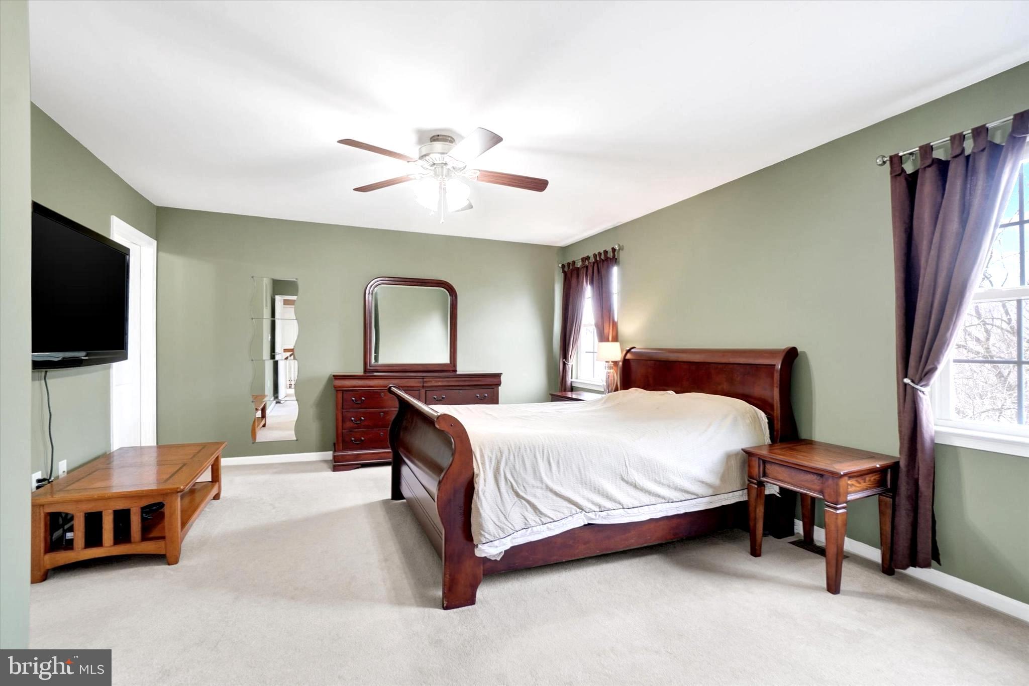 2512 Codorus Lane Spring Grove, PA 17362 - Photo 28 of 42 a bedroom with a bed and a flat screen tv