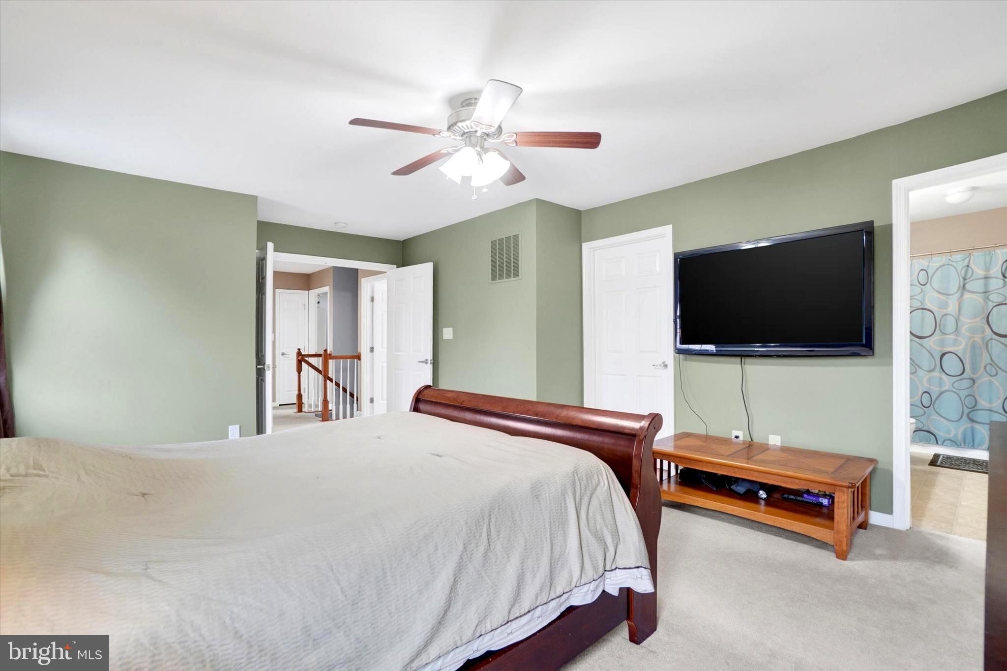 2512 Codorus Lane Spring Grove, PA 17362 - Photo 29 of 42 a bedroom with a bed and a flat screen tv