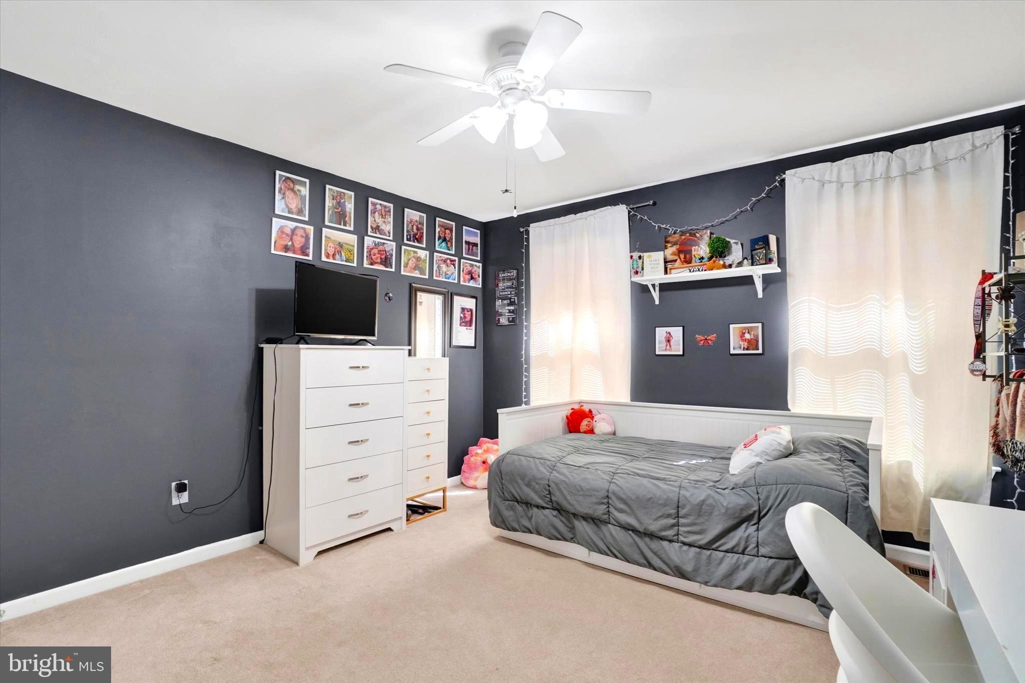 2512 Codorus Lane Spring Grove, PA 17362 - Photo 34 of 42 a bedroom with furniture and a flat screen tv