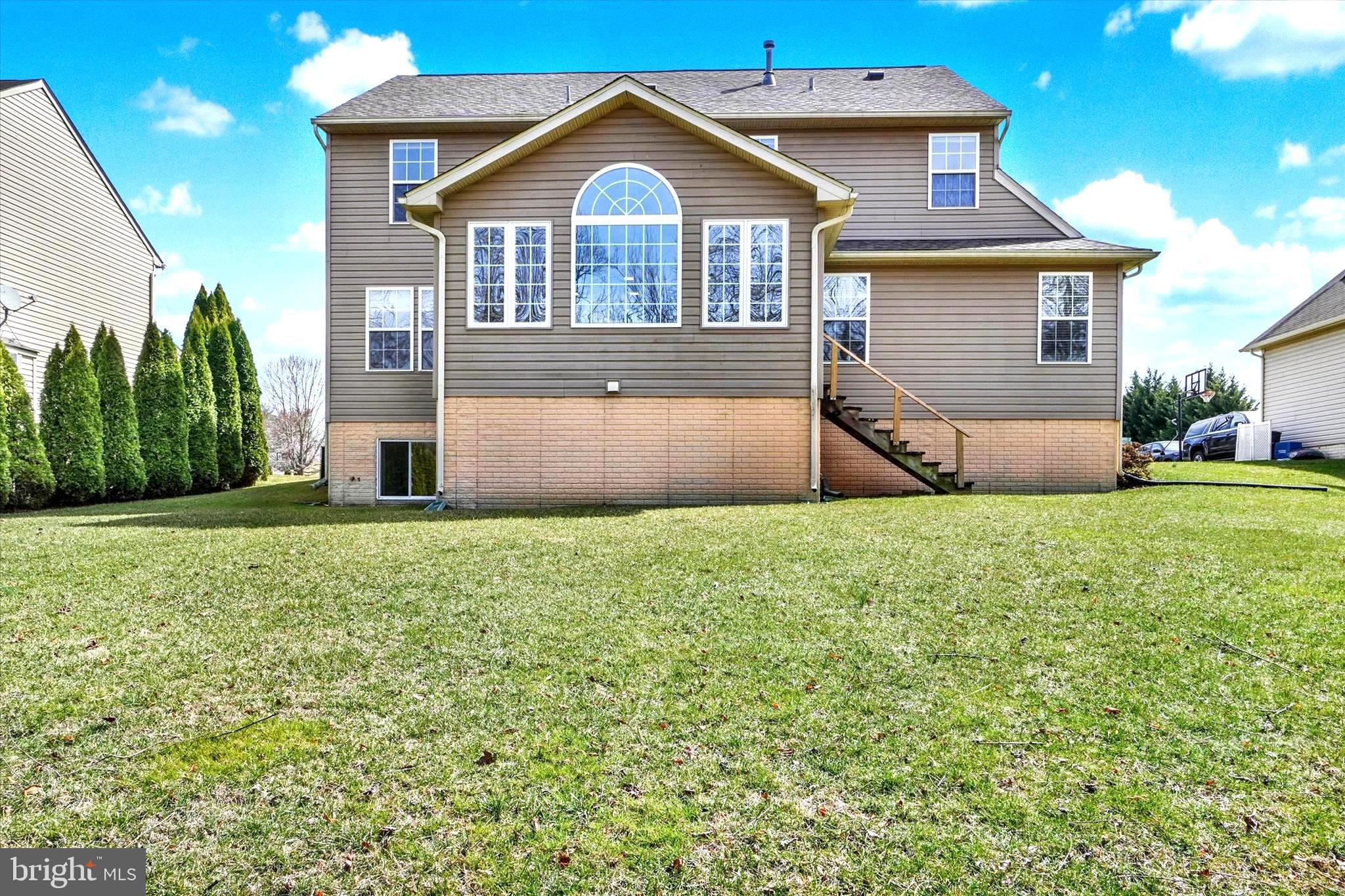 2512 Codorus Lane Spring Grove, PA 17362 - Photo 10 of 42 a front view of a house with garden