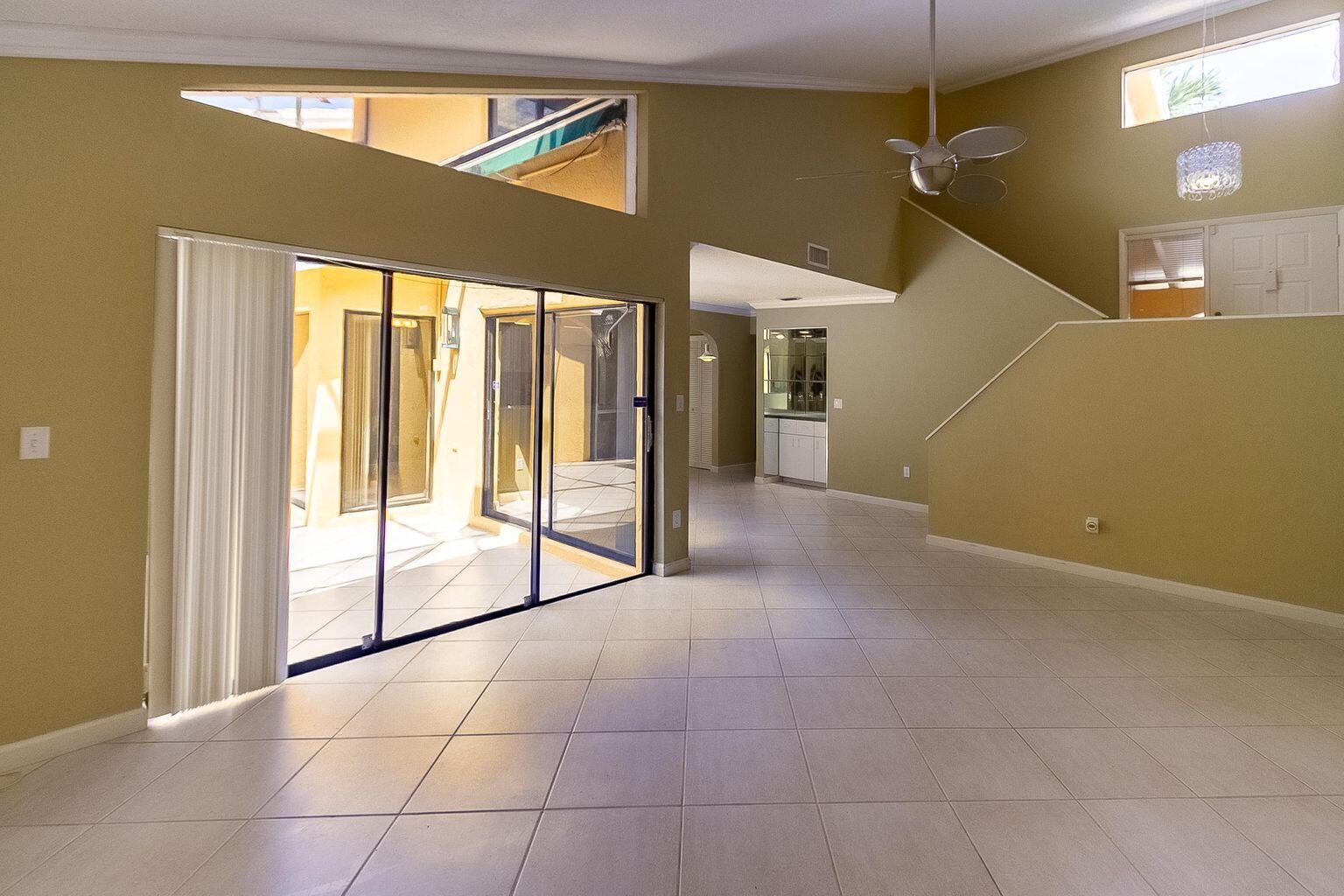 6120 Caliente Lane Boca Raton, FL 33433 - Photo 4 of 36 living room view to dining