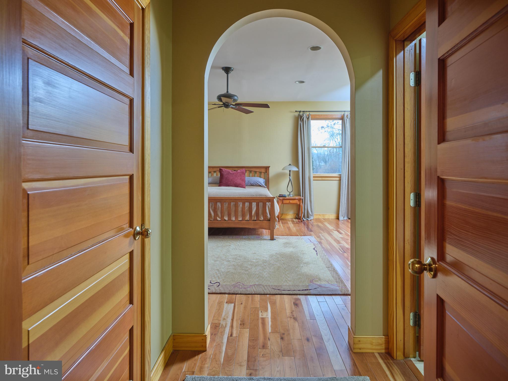 810 Callowhill Road Perkasie, PA 18944 - Photo 14 of 36 a view of a hallway with wooden floor and staircase