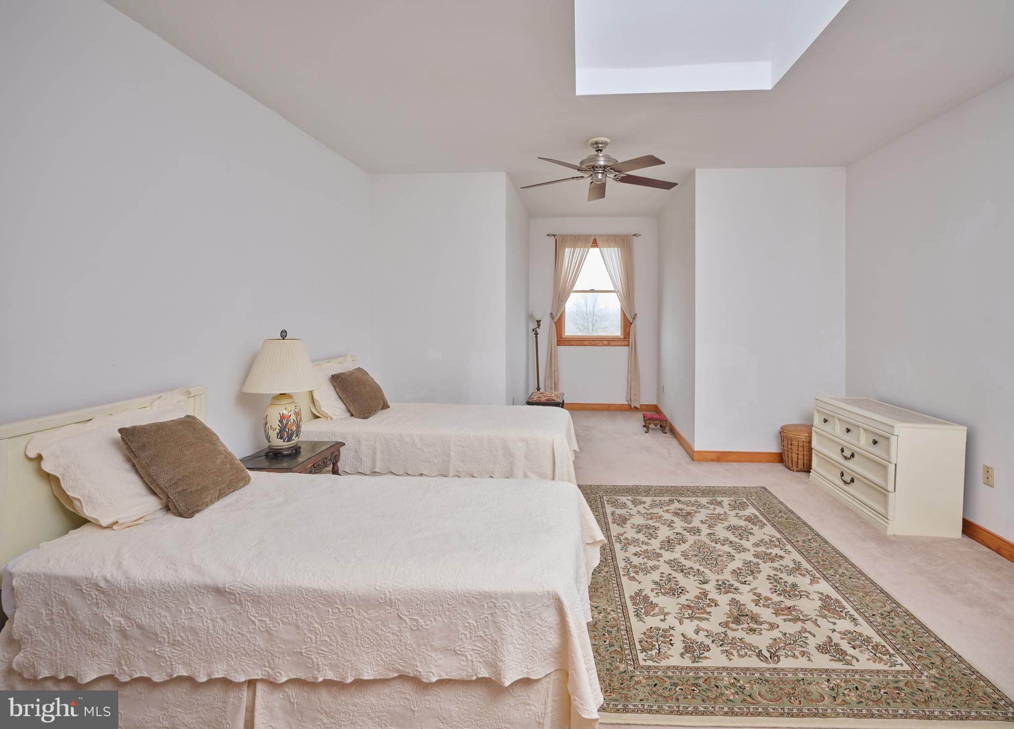 810 Callowhill Road Perkasie, PA 18944 - Photo 19 of 36 a bedroom with a bed and window