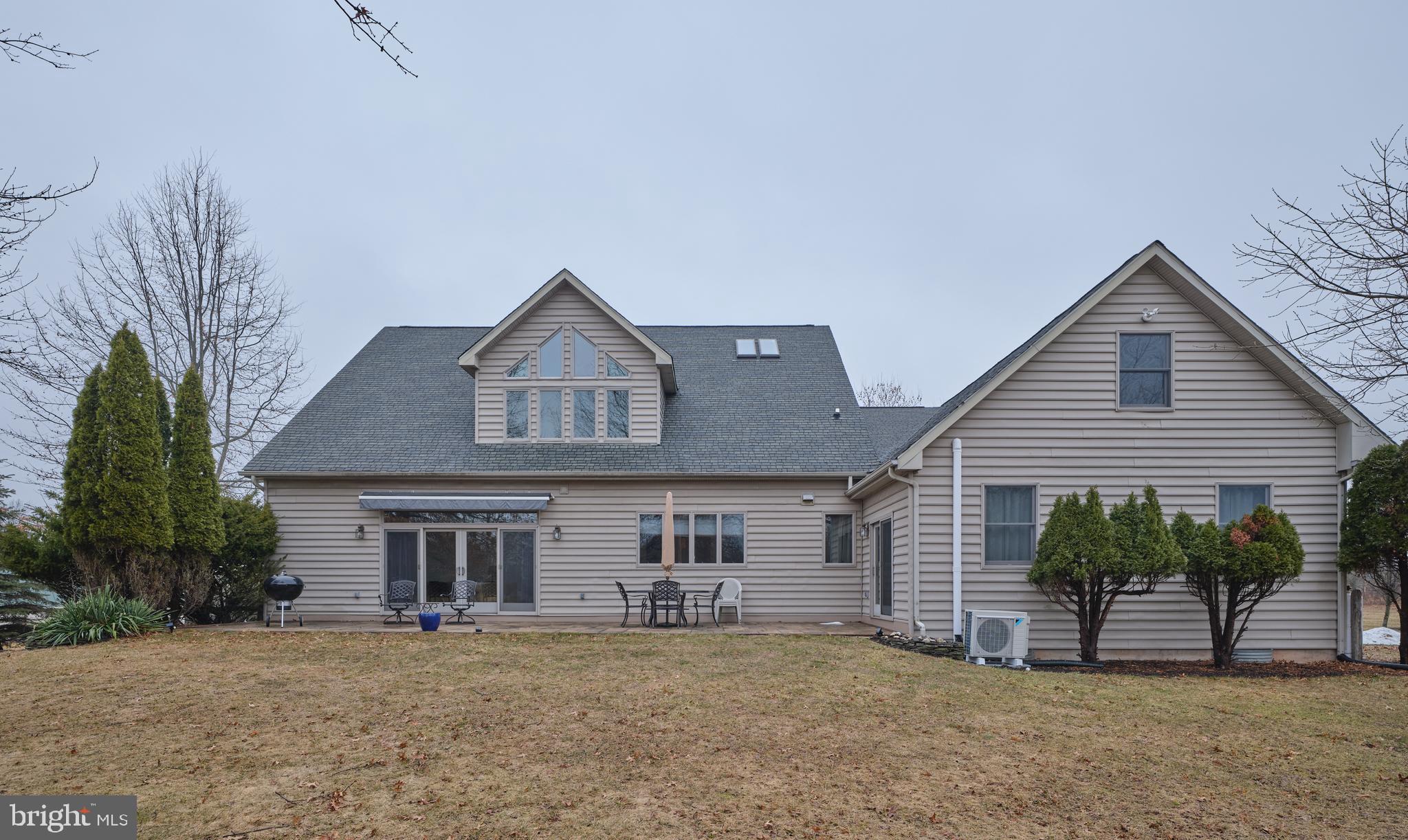 810 Callowhill Road Perkasie, PA 18944 - Photo 31 of 36 a view of a house with a yard and potted plants