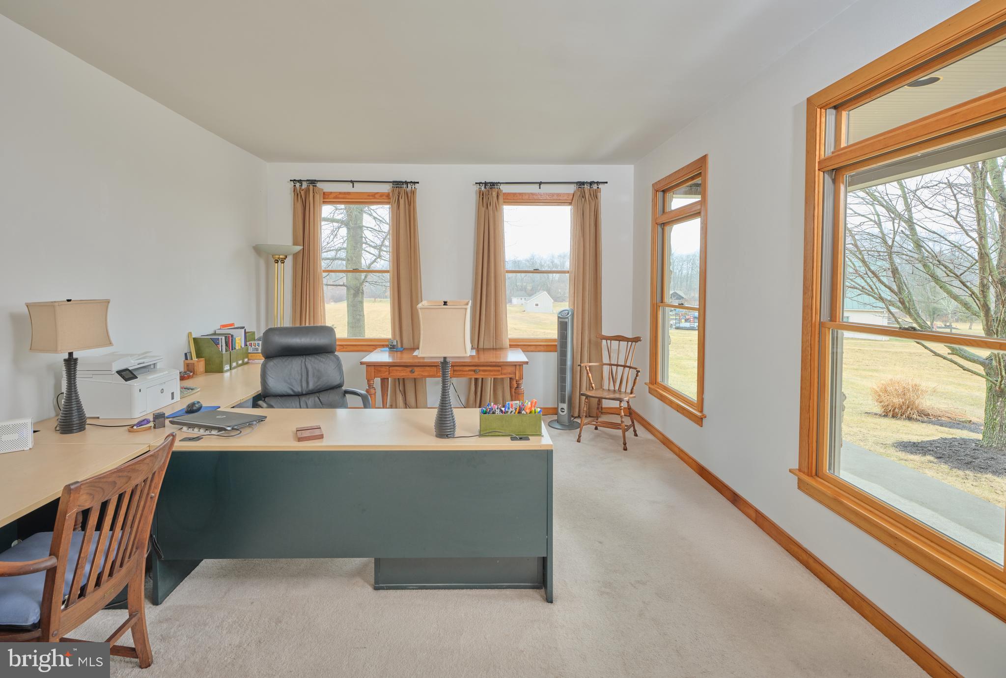 810 Callowhill Road Perkasie, PA 18944 - Photo 8 of 36 a view of a dining room with furniture a livingroom and chandelier