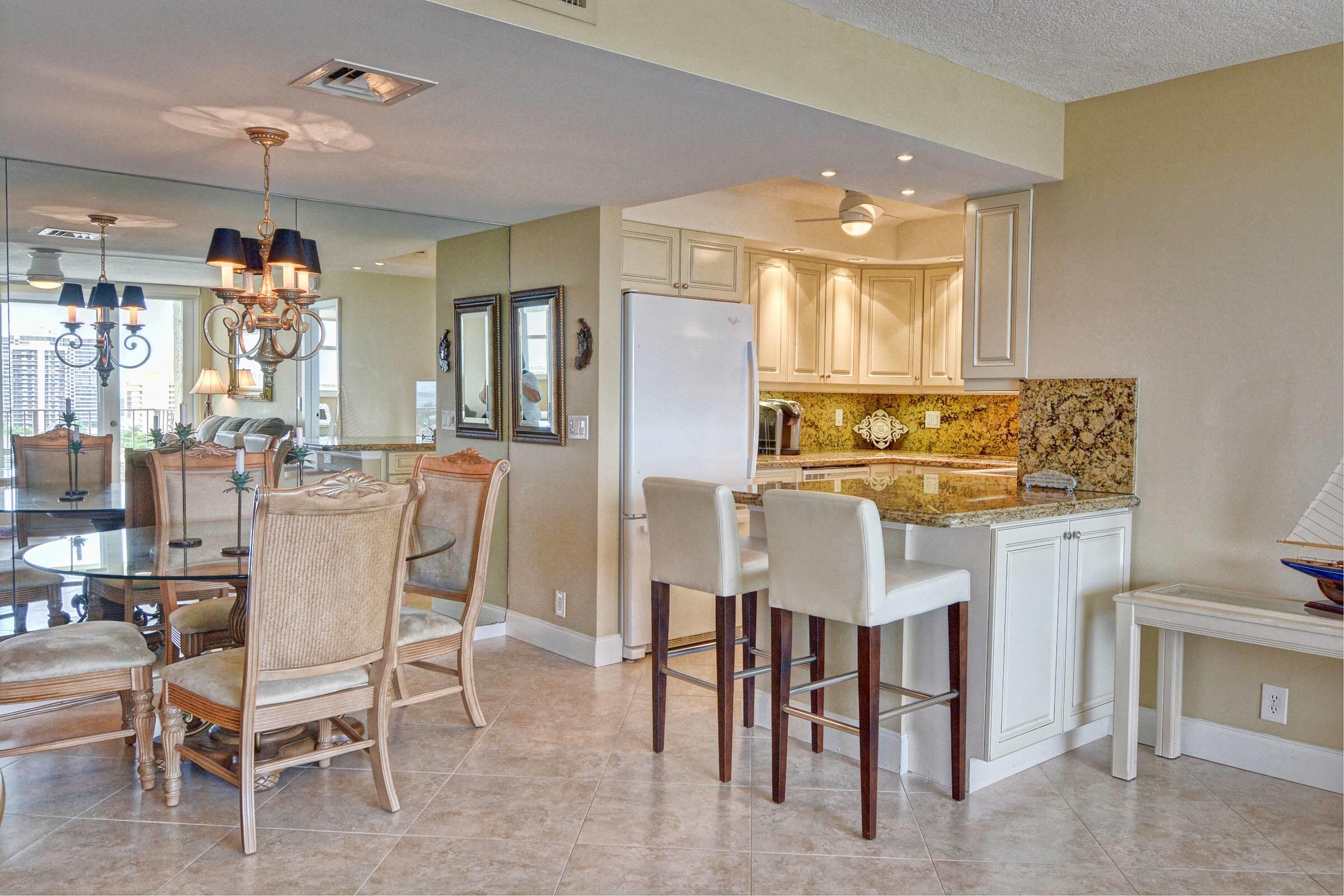 336 Golfview Road, Unit PH09 North Palm Beach, FL 33408 - Photo 3 of 26 Kitchen and Dining Area