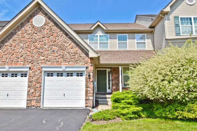 front view of a house with a small yard