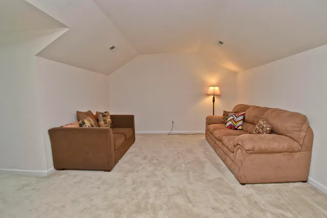 a living room with furniture and a couch