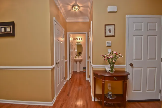 a bathroom with a toilet and a mirror