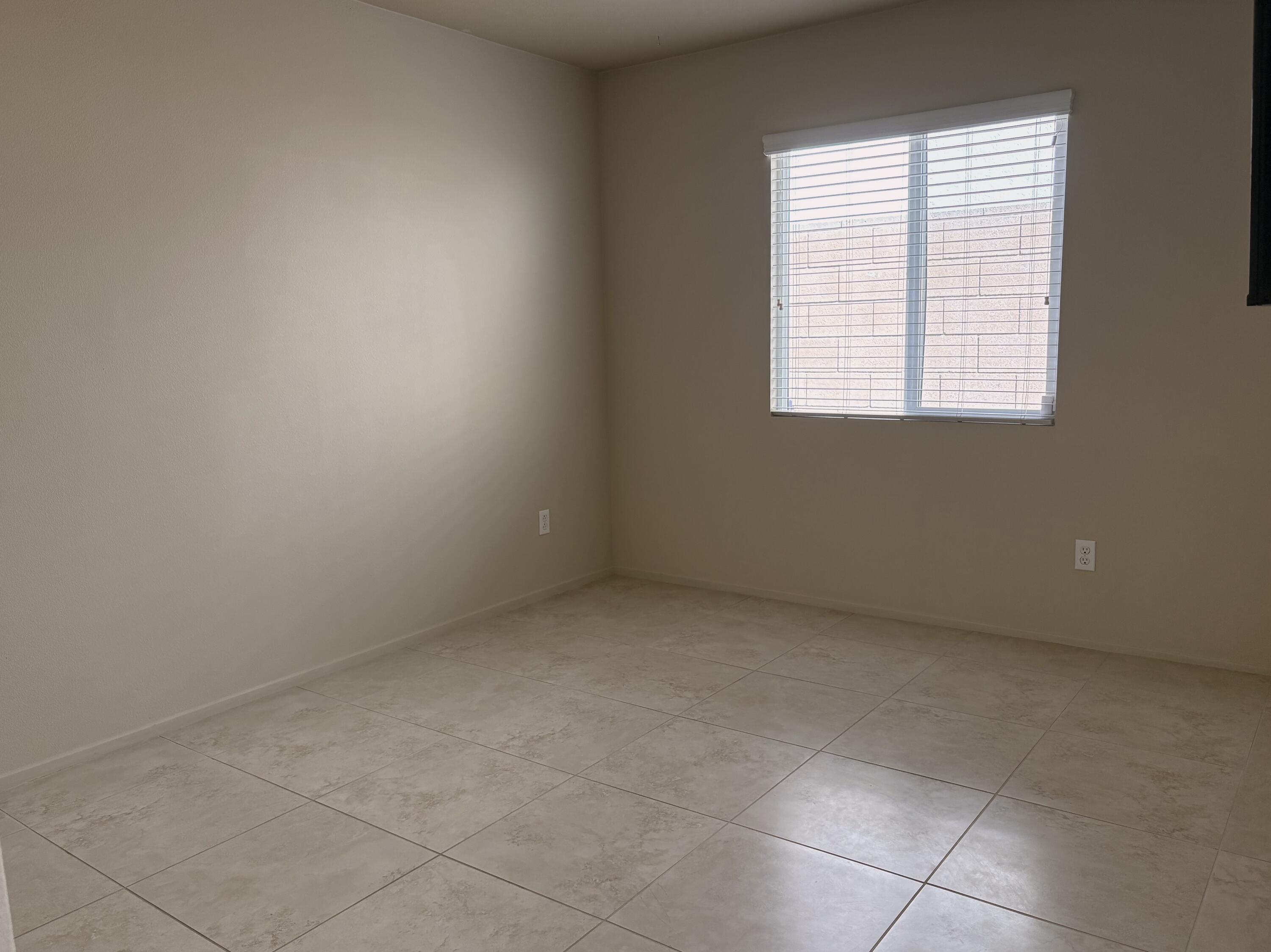 84175 Tramonto Way Indio, CA 92203 - Photo 19 of 22 an empty room with a window