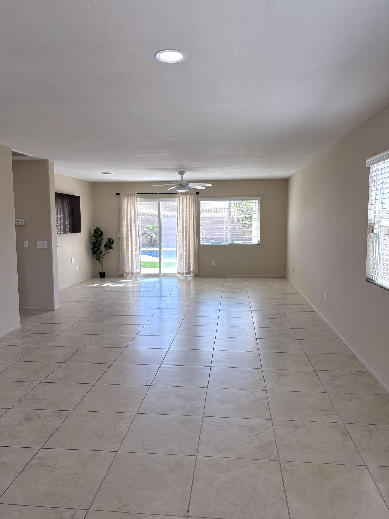 84175 Tramonto Way Indio, CA 92203 - Photo 9 of 22 a view of an empty room and window