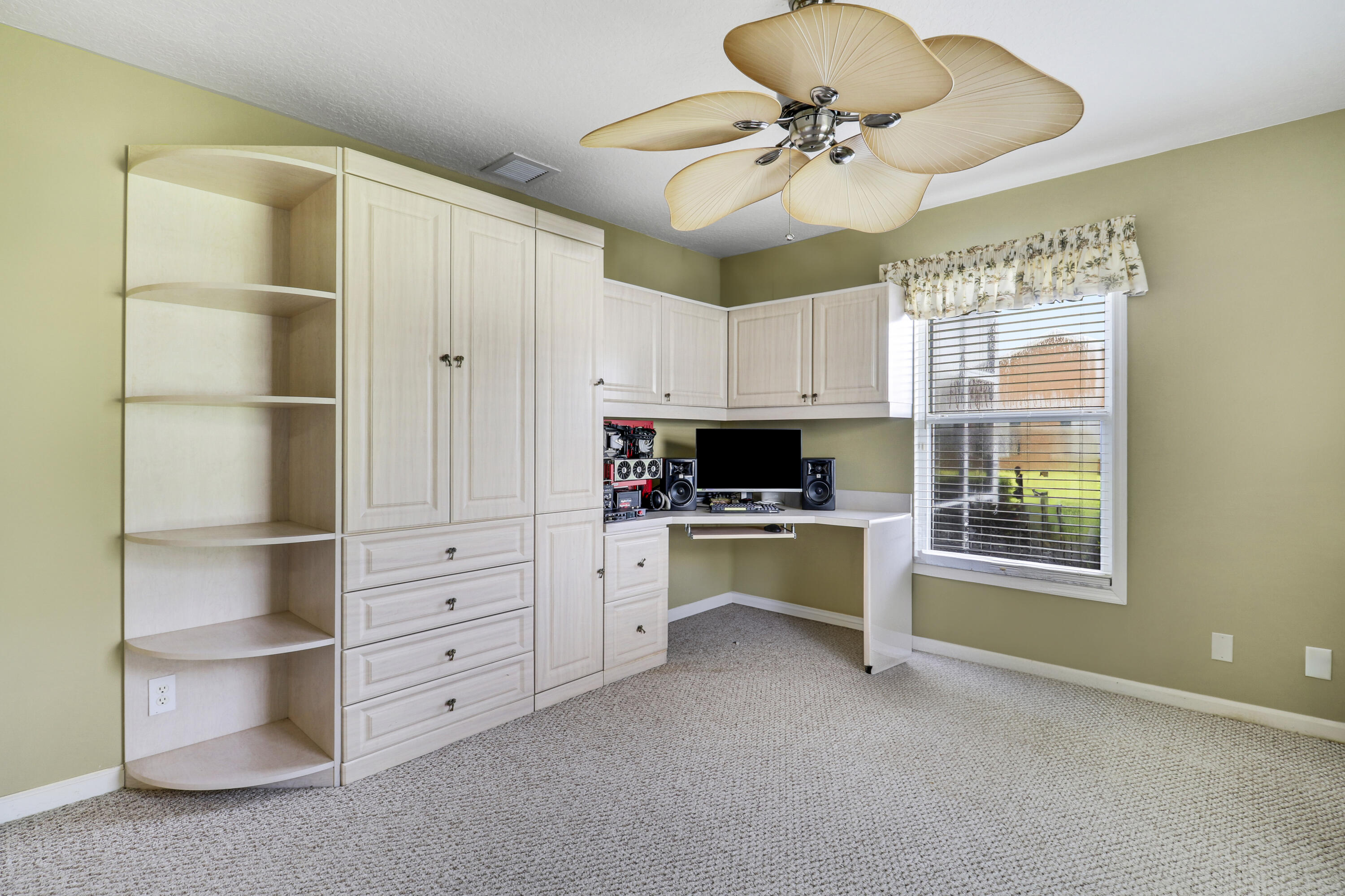 2698 Southwest Versailles Terrace Stuart, FL 34997 - Photo 25 of 38 Bedroom 3 with built-ins