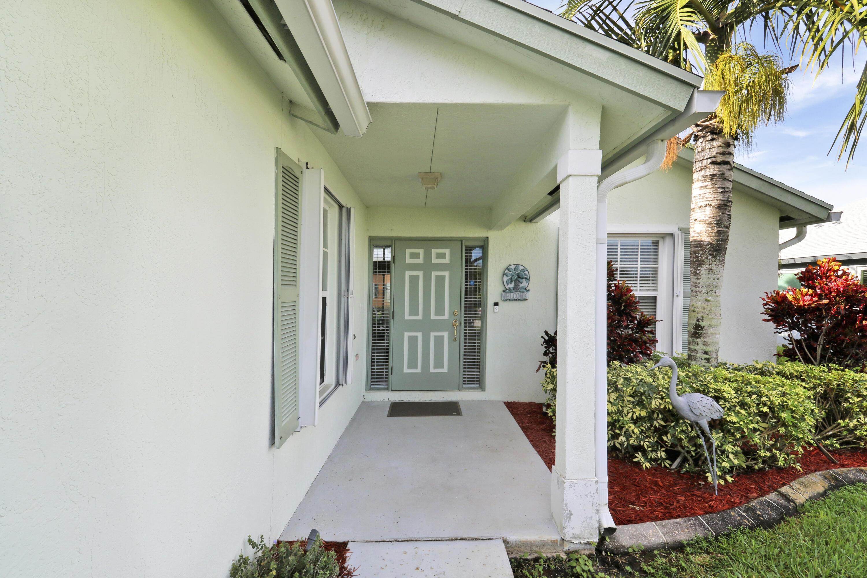 2698 Southwest Versailles Terrace Stuart, FL 34997 - Photo 3 of 38 Covered Entry
