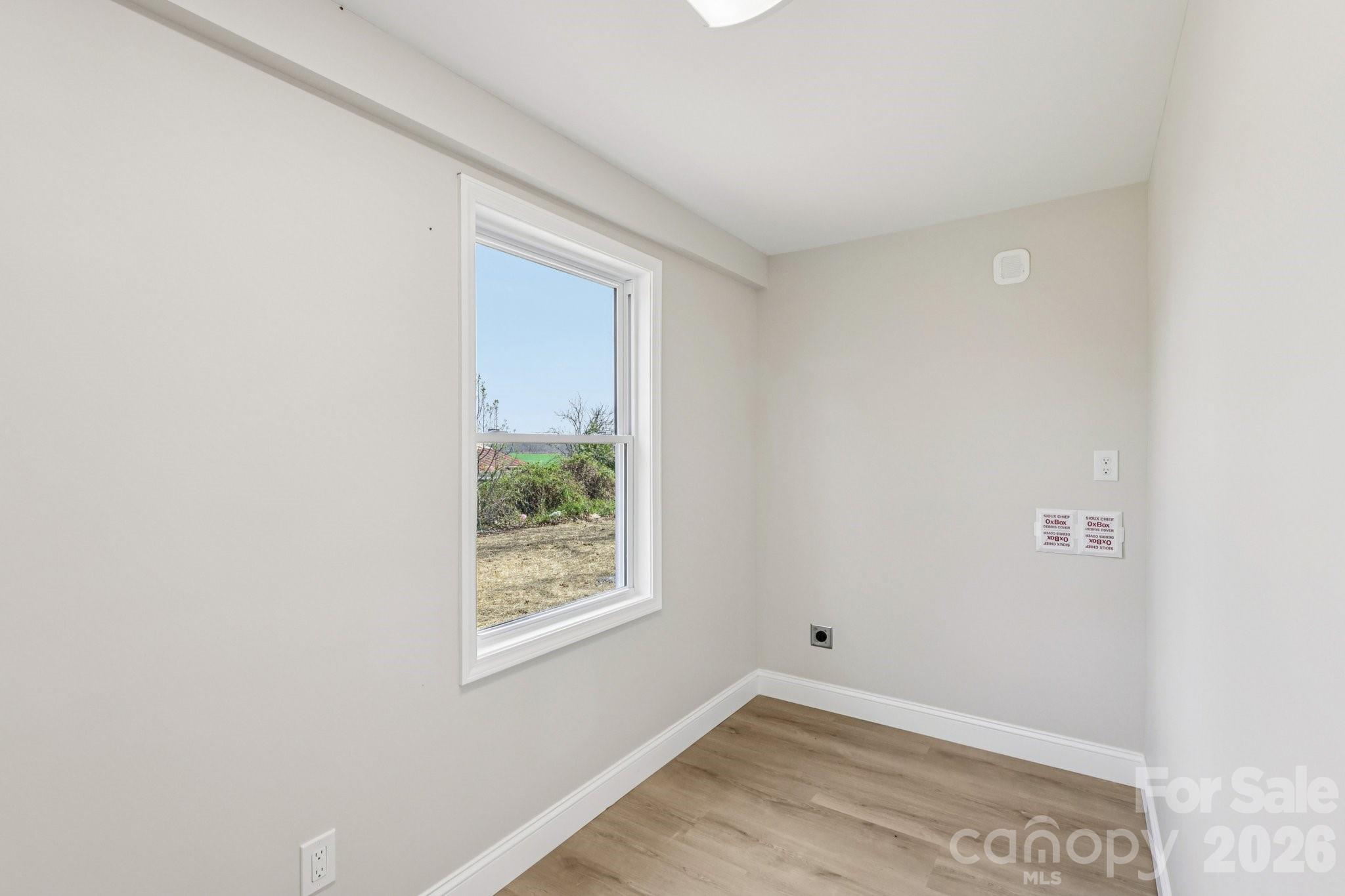 1403 Dudley Shoals Road Granite Falls, NC 28630 - Photo 12 of 20 a view of a room that has a window in it